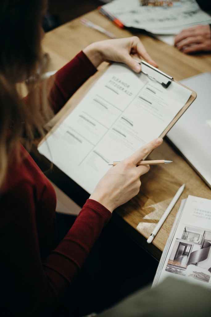 woman holding clipboard
